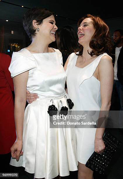 Actresses Ginnifer Goodwin and Rose McGowan attend the Prada book launch cocktail held at Prada on Rodeo Drive on November 13, 2009 in Beverly Hills,...