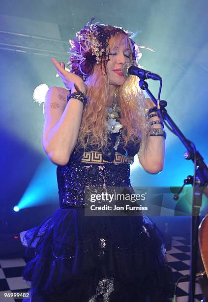 Courtney Love performs during Alice in Wonderland themed launch of 'Alice by Temperley' collection during London Fashion Week Autumn/Winter 2010 at...