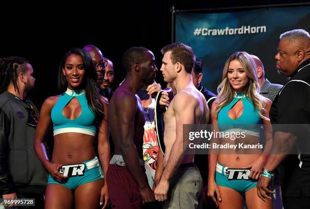 Terence Crawford and WBO welterweight champion Jeff Horn face off during their official weigh-in at MGM Grand Garden Arena on June 8, 2018 in Las...