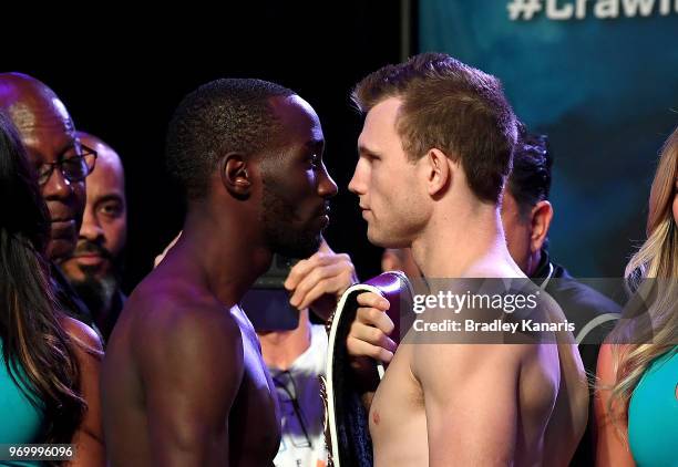 Terence Crawford and WBO welterweight champion Jeff Horn face off during their official weigh-in at MGM Grand Garden Arena on June 8, 2018 in Las...