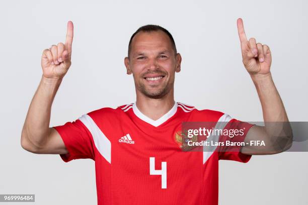 Sergey Ignashevich of Russia poses for a portrait during the official FIFA World Cup 2018 portrait session at Federal Sports Centre Novogorsk on June...