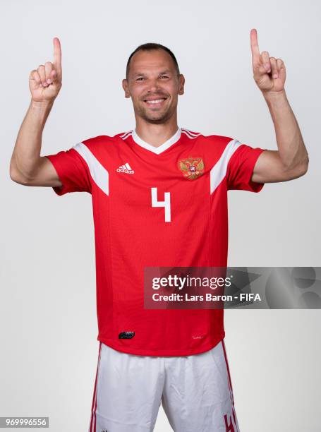 Sergey Ignashevich of Russia poses for a portrait during the official FIFA World Cup 2018 portrait session at Federal Sports Centre Novogorsk on June...