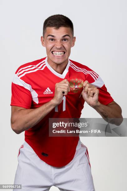 Roman Zobnin of Russia poses for a portrait during the official FIFA World Cup 2018 portrait session at Federal Sports Centre Novogorsk on June 8,...