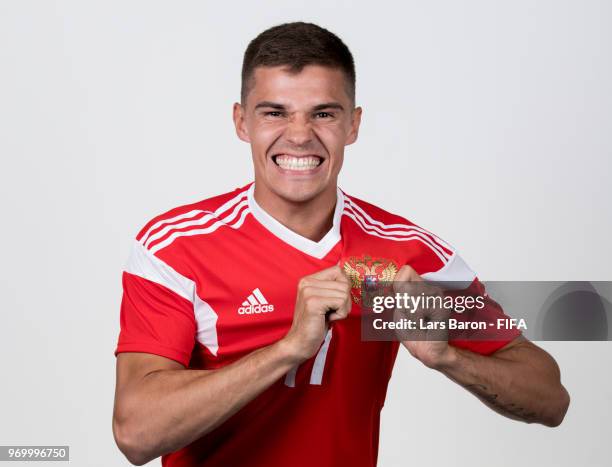 Roman Zobnin of Russia poses for a portrait during the official FIFA World Cup 2018 portrait session at Federal Sports Centre Novogorsk on June 8,...