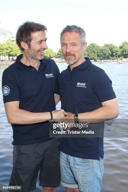 German actor Guido Broscheit and Andreas Brucker attend the '14. Drachenboot Cup' charity event on June 8, 2018 in Hamburg, Germany.