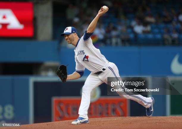 Happ of the Toronto Blue Jays delivers a pitch in the first inning during MLB game action against the Baltimore Orioles at Rogers Centre on June 8,...