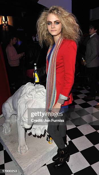 Cara Delevingne attends Alice in Wonderland themed launch of 'Alice by Temperley' collection during London Fashion Week Autumn/Winter 2010 at...