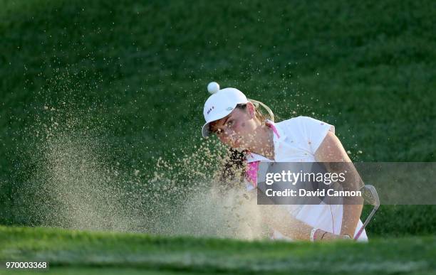 Lily May Humphreys of the Great Britain and Irlenad Team plays her second shot on teh 13th hole in her match with Paula Grant against Lauren...