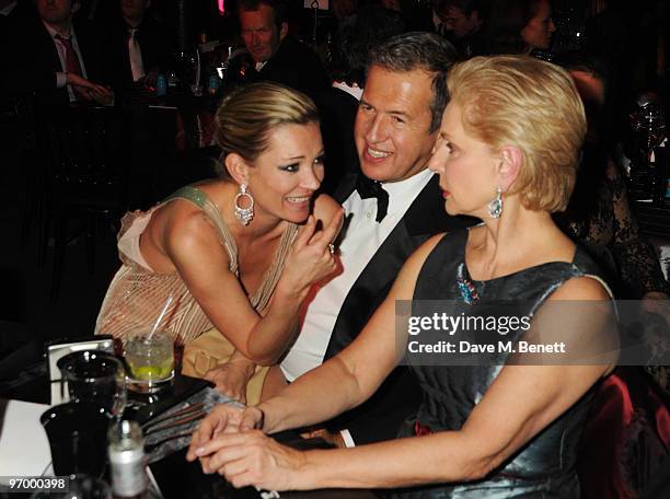 Kate Moss, Mario Testino and Carolina Herrera attend the Love Ball London, at the Roundhouse on February 23, 2010 in London, England.