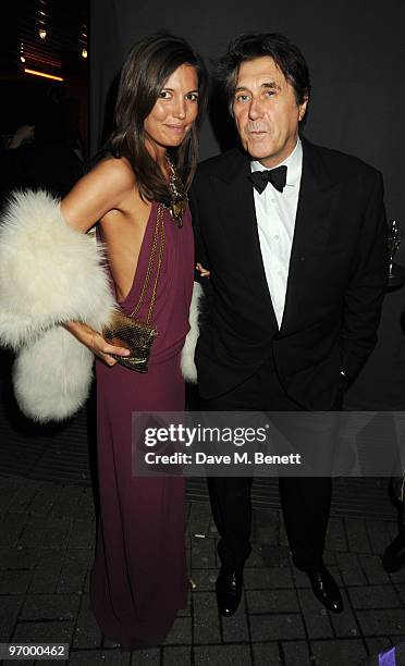 Amanda Sheppard and Bryan Ferry attend the Love Ball London, at the Roundhouse on February 23, 2010 in London, England.