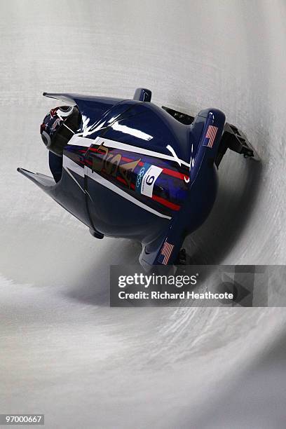 Erin Pac and Elana Meyers of the United States compete in United States 2 during the Women's Bobsleigh Heat 1 on day 12 of the 2010 Vancouver Winter...