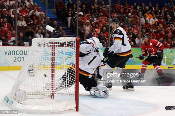 Jarome Iginla of Canada shoots the puck past Thomas Greiss of Germany for a goal in the second period during the ice hockey Men's Qualification...