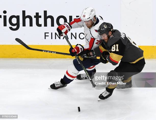 Lars Eller of the Washington Capitals and Jonathan Marchessault of the Vegas Golden Knights battle for the puck in the second period of Game Five of...