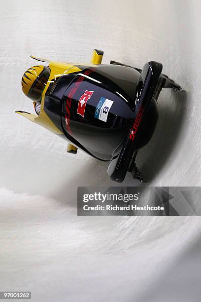 Sabina Hafner and Caroline Spahni of Switzerland compete in Switzerland 1 during the Women's Bobsleigh Heat 1 on day 12 of the 2010 Vancouver Winter...