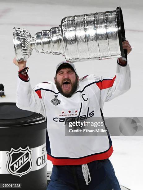 Alex Ovechkin of the Washington Capitals hoists the Stanley Cup after the team's 4-3 win over the Vegas Golden Knights in Game Five of the 2018 NHL...