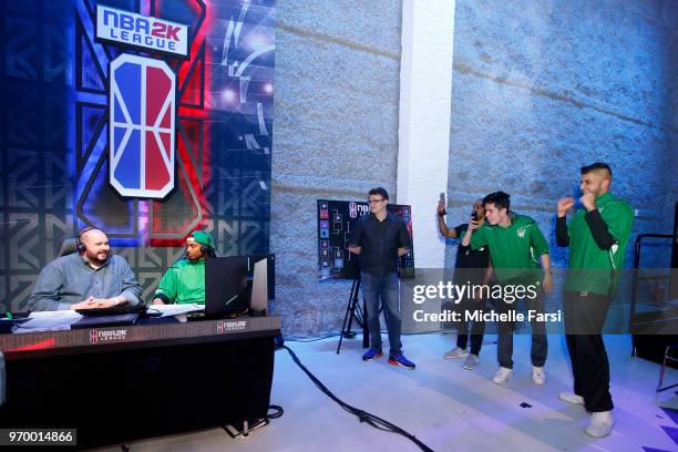 Speedbrook of Celtics Crossover Gaming talks to Scott Cole after the game against Jazz Gaming during the NBA 2K League Mid Season Tournament on June...