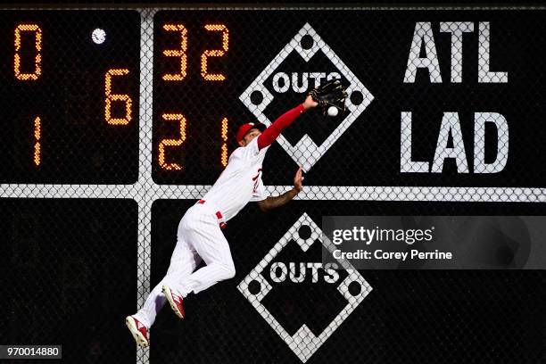 Nick Williams of the Philadelphia Phillies can't make a catch in right field during the fourth inning against the Milwaukee Brewers at Citizens Bank...