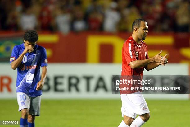 Internacioanl's footballer Alecsandro celebrates his goal against Equadorean Emelec during their Libertadores Cup match at Beira Rio Stadium in Porto...