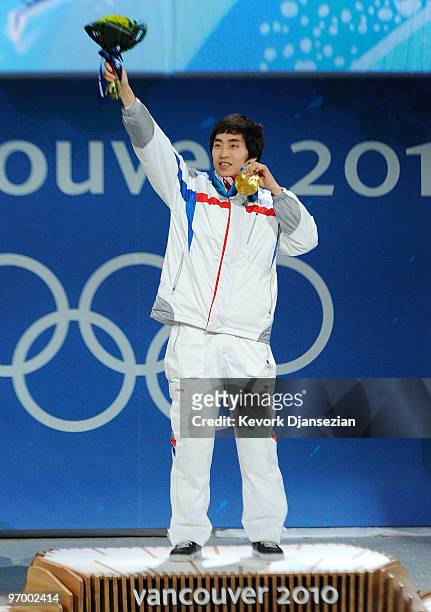 Lee Seung-Hoon of South Korea celebrates winning the gold for the men's 10000 m speed skating during the medal ceremony on day 12 of the Vancouver...