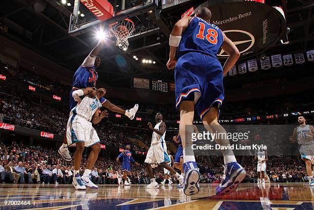 Antawn Jamison of the Cleveland Cavaliers dunks the ball over David West of the New Orleans Hornets on February 23, 2010 at The Quicken Loans Arena...