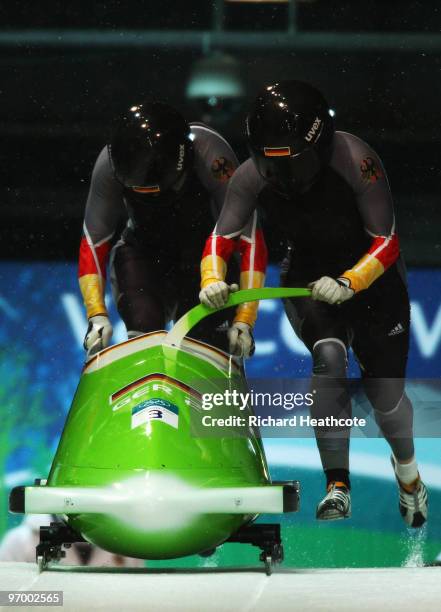 Cathleen Martini and Romy Logsch of Germany compete in Germany 2 during the Women's Bobsleigh Heat 2 on day 12 of the 2010 Vancouver Winter Olympics...