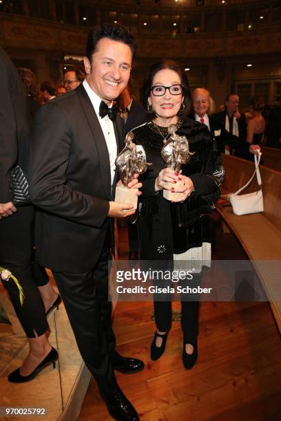 Singer Piotr Beczala and Nana Mouskouri with their awards during the European Culture Awards TAURUS 2018 at Dresden Frauenkirche on June 8, 2018 in...
