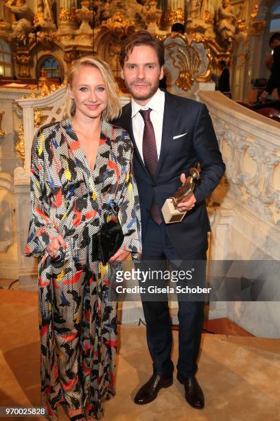 Anna Maria Muehe and Daniel Bruehl with his award during the European Culture Awards TAURUS 2018 at Dresden Frauenkirche on June 8, 2018 in Dresden,...