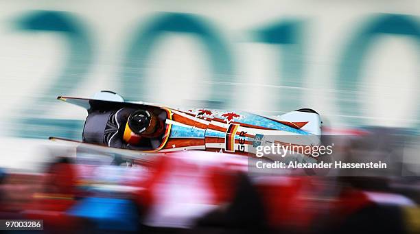 Sandra Kiriasis and Christin Senkel of Germany compete in Germany 1 during the Women's Bobsleigh race on day 12 of the 2010 Vancouver Winter Olympics...