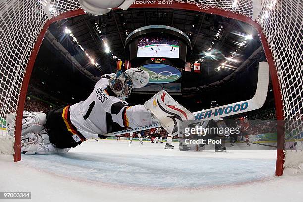 Thomas Greiss of Germany dives to make a save during the ice hockey Men's Qualification Playoff game between Germany and Canada on day 12 of the...