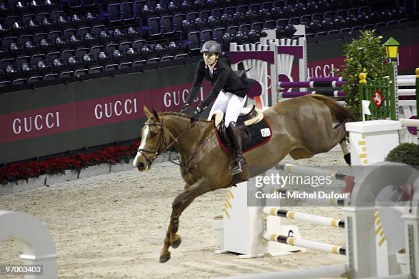 Martina Hingis rides and competes during the Gucci Masters Competition at Paris Nord Villepinte on December 11, 2009 in Paris, France.