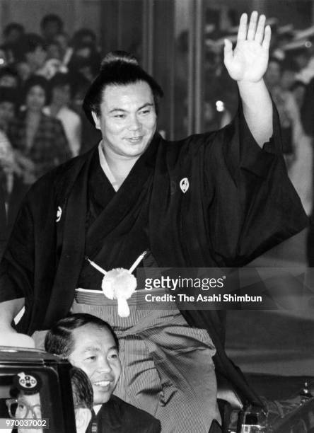 Yokozuna Chiyonofuji celebrates during a victory parade after winning the tournament on day fifteen of the Grand Sumo Autumn Tournament at Ryogoku...