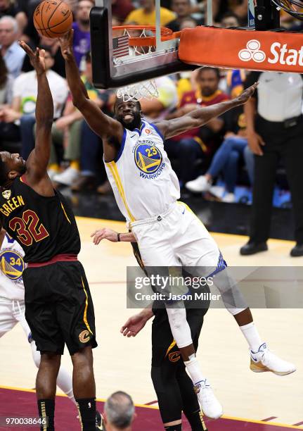 Draymond Green of the Golden State Warriors defends Jeff Green of the Cleveland Cavaliers in the first half during Game Four of the 2018 NBA Finals...