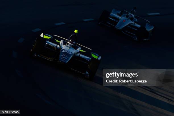 Max Chilton, driver of the Gallagher Chevrolet, leads Josef Newgarden, driver of the Verizon Team Penske Chevrolet, during practice for the Verizon...