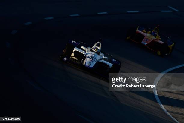 Max Chilton, driver of the Gallagher Chevrolet, leads Josef Newgarden, driver of the Verizon Team Penske Chevrolet, during practice for the Verizon...