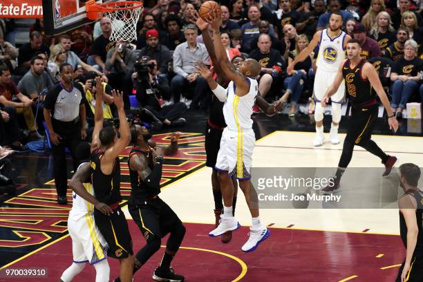 David West of the Golden State Warriors shoots the ball over Jeff Green of the Cleveland Cavaliers in Game Four of the 2018 NBA Finals on June 8,...
