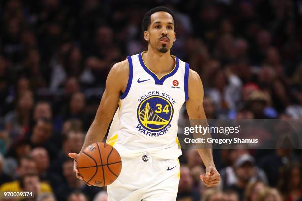 Shaun Livingston of the Golden State Warriors dribbles the ball up the court against the Cleveland Cavaliers in the first half during Game Four of...