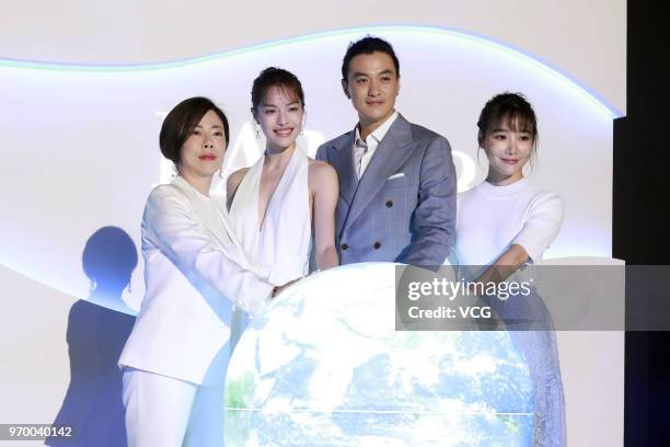 Actor Zhou Yiwei and actress Elane Zhong attend the Lamer event on June 8, 2018 in Beijing, China.