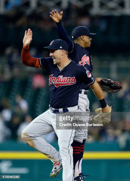 Lonnie Chisenhall of the Cleveland Indians celebrates with Francisco Lindor of the Cleveland Indians after a 4-1 win over the Detroit Tigers at...