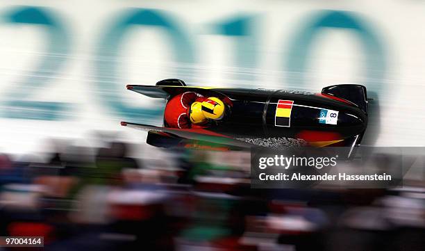 Sabina Hafner and Caroline Spahni of Switzerland compete in Switzerland 1 during the Women's Bobsleigh Heat race on day 12 of the 2010 Vancouver...