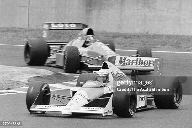 Alain Prost of France and McLaren-Honda competes in the qualifying of the Formula One Japanese Grand Prix at Suzuka Circuit on October 21, 1989 in...