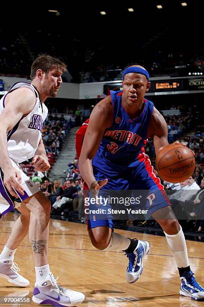 Charlie Villanueva of the Detroit Pistons drives to the basket around Andres Nocioni of the Sacramento Kings on February 23, 2010 at ARCO Arena in...