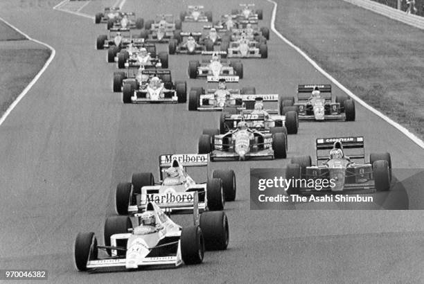 Alain Prost of France and McLaren-Honda leads at the start of the race of the Formula One Japanese Grand Prix at Suzuka Circuit on October 22, 1989...