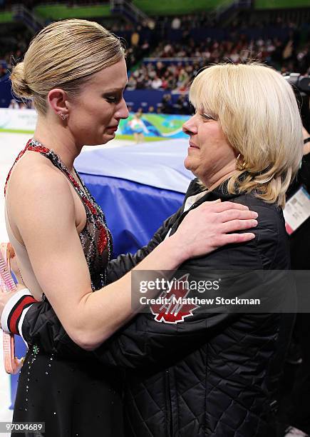 Joannie Rochette of Canada embraces her coach Manon Perron after competing in the Ladies Short Program Figure Skating on day 12 of the 2010 Vancouver...