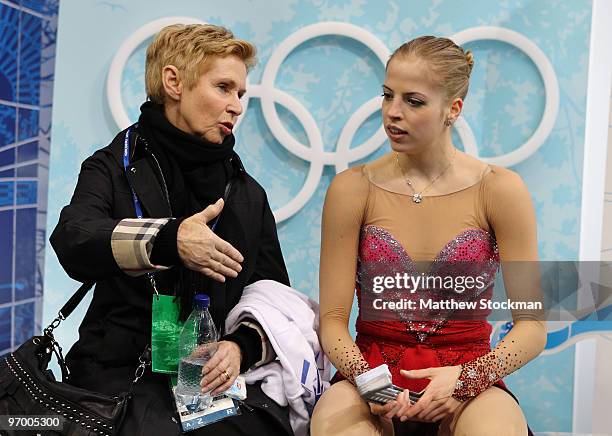 Carolina Kostner of Italy reacts after competing in the Ladies Short Program Figure Skating on day 12 of the 2010 Vancouver Winter Olympics at...