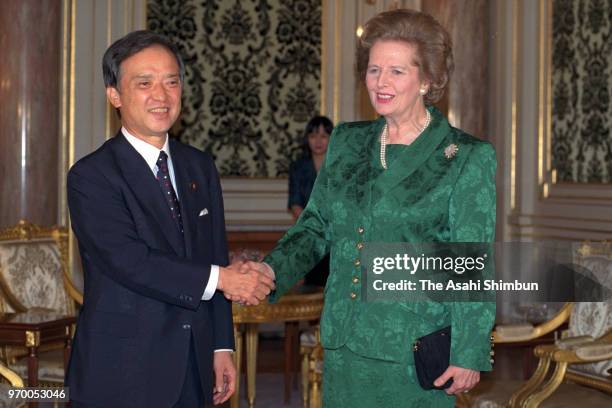 British Prime Minister Margaret Thatcher shakes hands with Japanese Prime Minister Toshiki Kaifu prior to their meeting at the Akasaka State...