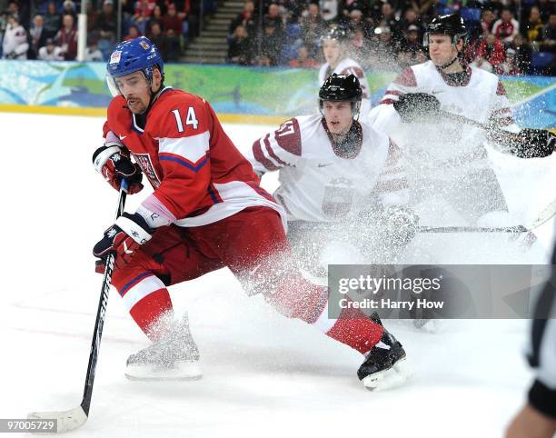 Tomas Plekanec of Czech Republic controls the puck during the ice hockey Men's Play-off qualification match between the Czech Republic and Latvia on...