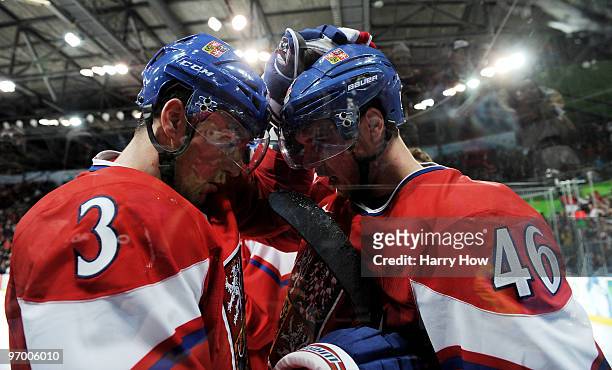 David Krejci of Czech Republic is congratulated by teammate Marek Zidlicky after scoring the matchwinning goal in overtime during the ice hockey...