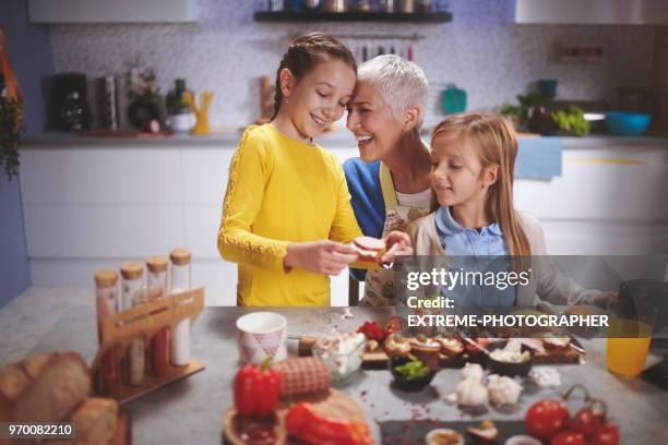 family in the kitchen - extreme dieting stock pictures, royalty-free photos & images