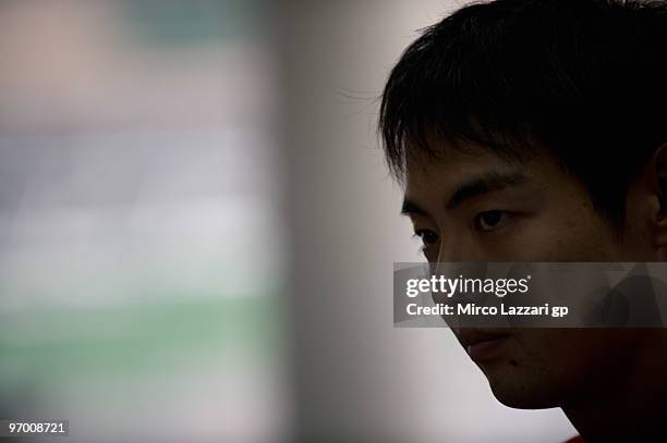 Hiroshi Aoyama of Japan and Interwetten MotoGP Team looks on in Media Center during the MotoGP Factory riders test at Sepang Circuit on February 24,...