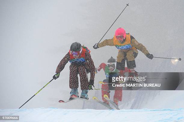 Ashleigh McIvor of Canada, Hedda Berntsen of Norway, and Marion Josserand of France, compete during the Women's ski cross final at Cypress Mountain...